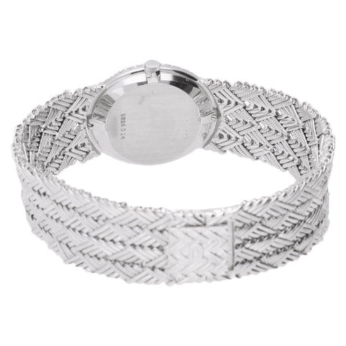 18ct white gold Piaget ref. 9826 opal/pearl set dial and diamond set bezel bracelet watch. Made 1970