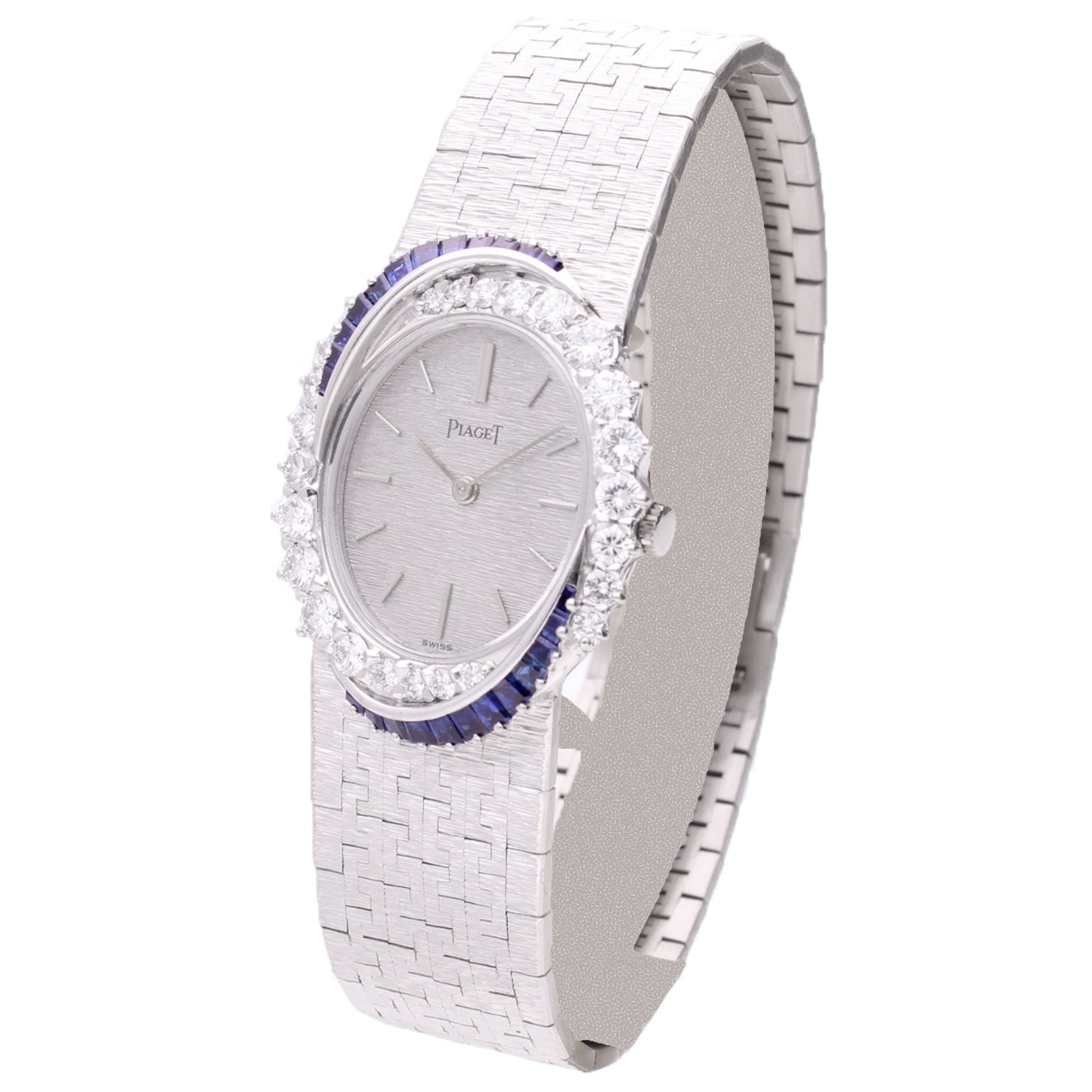 18ct white gold Piaget ref. 9348 diamond and sapphire set bezel bracelet watch. Made 1970