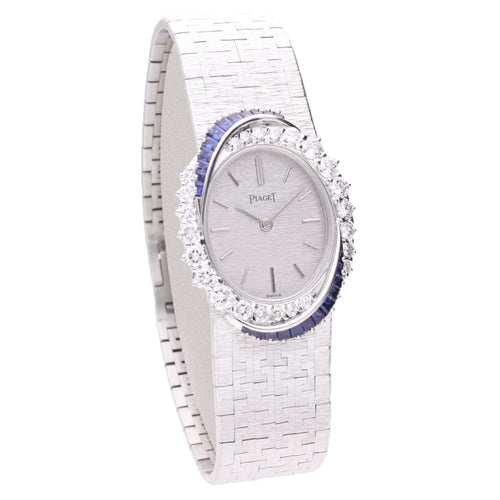 18ct white gold Piaget ref. 9348 diamond and sapphire set bezel bracelet watch. Made 1970