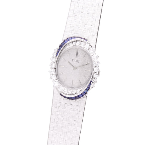 18ct white gold Piaget ref. 9348 diamond and sapphire set bezel bracelet watch. Made 1970