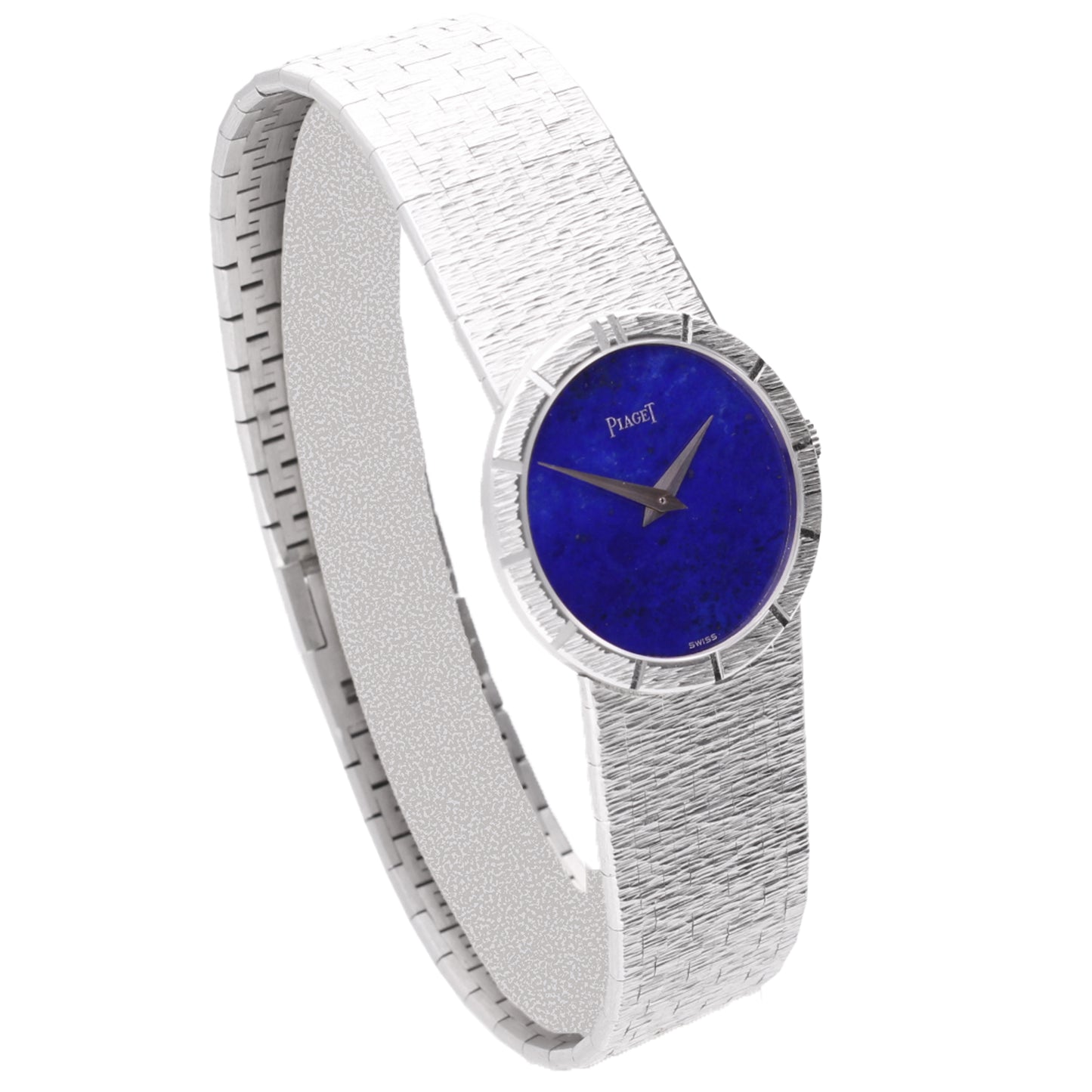 18ct white gold Piaget ref. 9701 bracelet watch with lapis lazuli dial and chapter engraved bezel. Made 1970