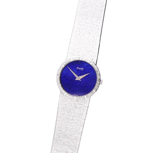 18ct white gold Piaget ref. 9701 bracelet watch with lapis lazuli dial and chapter engraved bezel. Made 1970