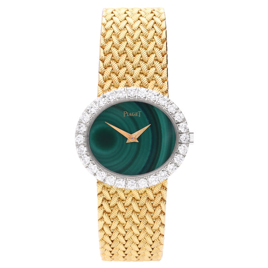 18ct yellow gold Piaget malachite dial and diamond set bezel bracelet watch. Made 1970