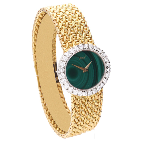 18ct yellow gold Piaget malachite dial and diamond set bezel bracelet watch. Made 1970