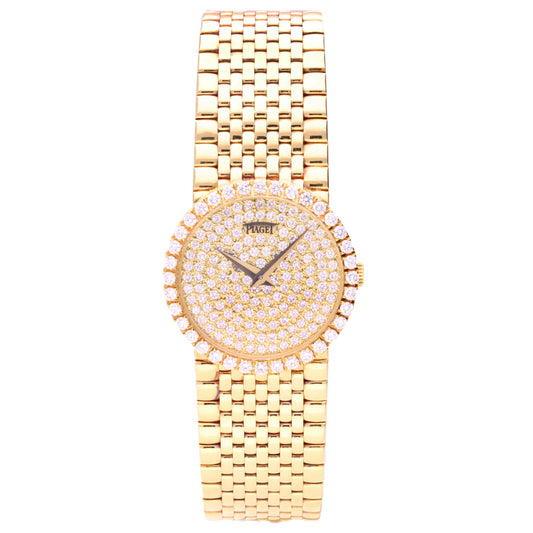 18ct yellow gold Piaget ref. 9706 with pavé diamond set dial and diamond set bezel. Made 1991