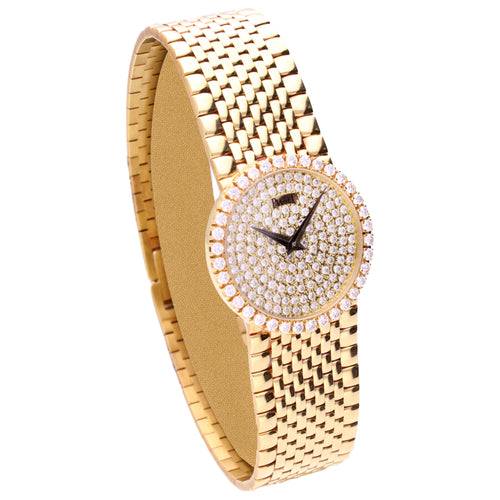 18ct yellow gold Piaget ref. 9706 with pavé diamond set dial and diamond set bezel. Made 1991