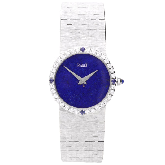 18ct white gold Piaget ref. 9706 bracelet watch with lapis lazuli dial and diamond set bezel with sapphire quarters. Made 1970