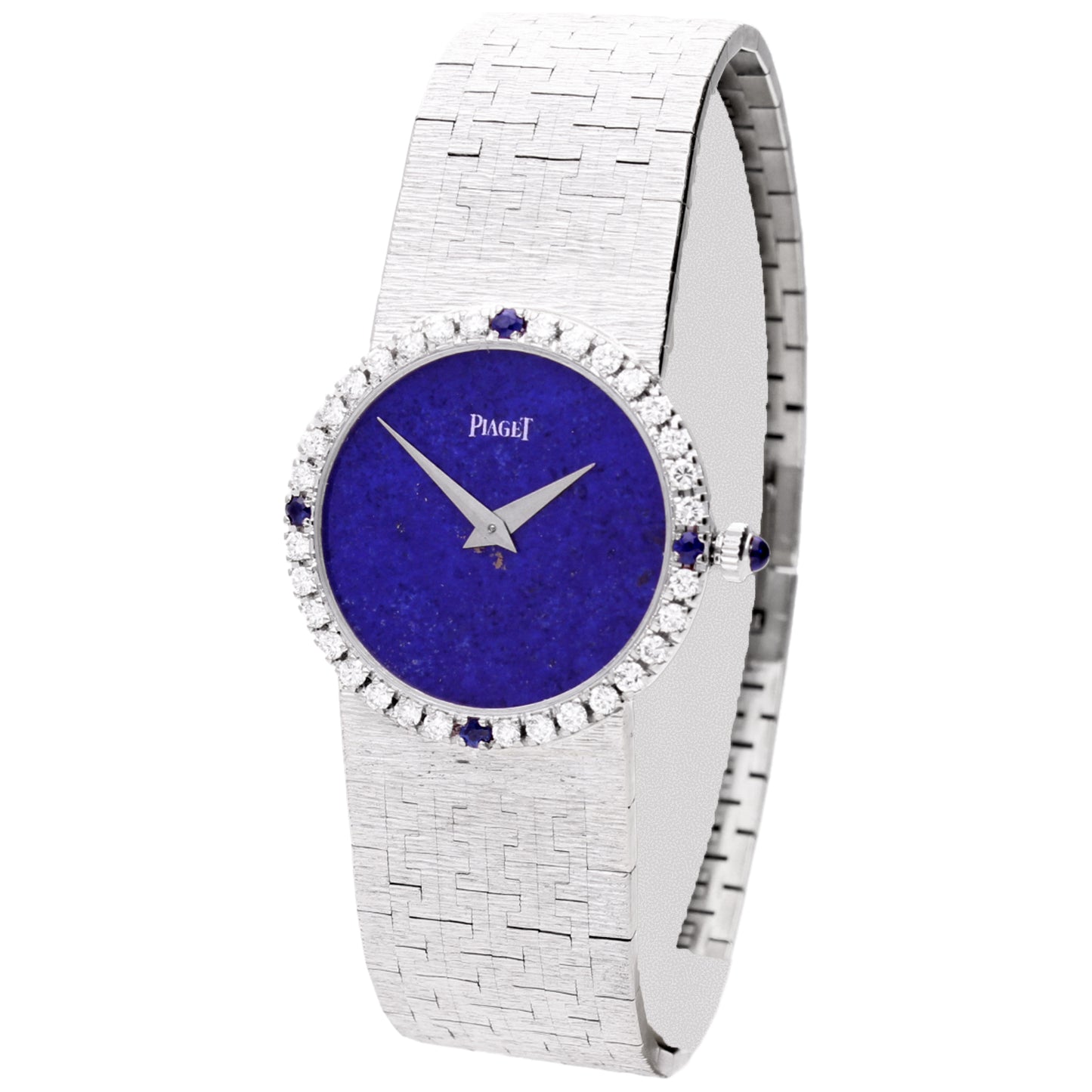 18ct white gold Piaget ref. 9706 bracelet watch with lapis lazuli dial and diamond set bezel with sapphire quarters. Made 1970