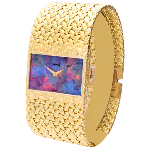 18ct yellow gold Piaget ref. 92120 cuff watch with opal dial. Made 1972