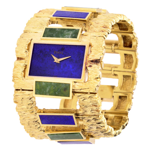 18ct yellow gold Piaget ref. 9212 lapis lazuli and jadeite set cuff watch. Made 1969