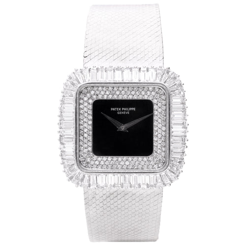 18ct white gold Patek Philippe ref. 3725/2 Bracelet watch with onyx and diamond set dial with baguette diamond set bezel. Made 1978