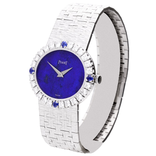 18ct white gold Piaget ref. 9804 bracelet watch with lapis lazuli dial and diamond set bezel with sapphire quarters. Made 1970