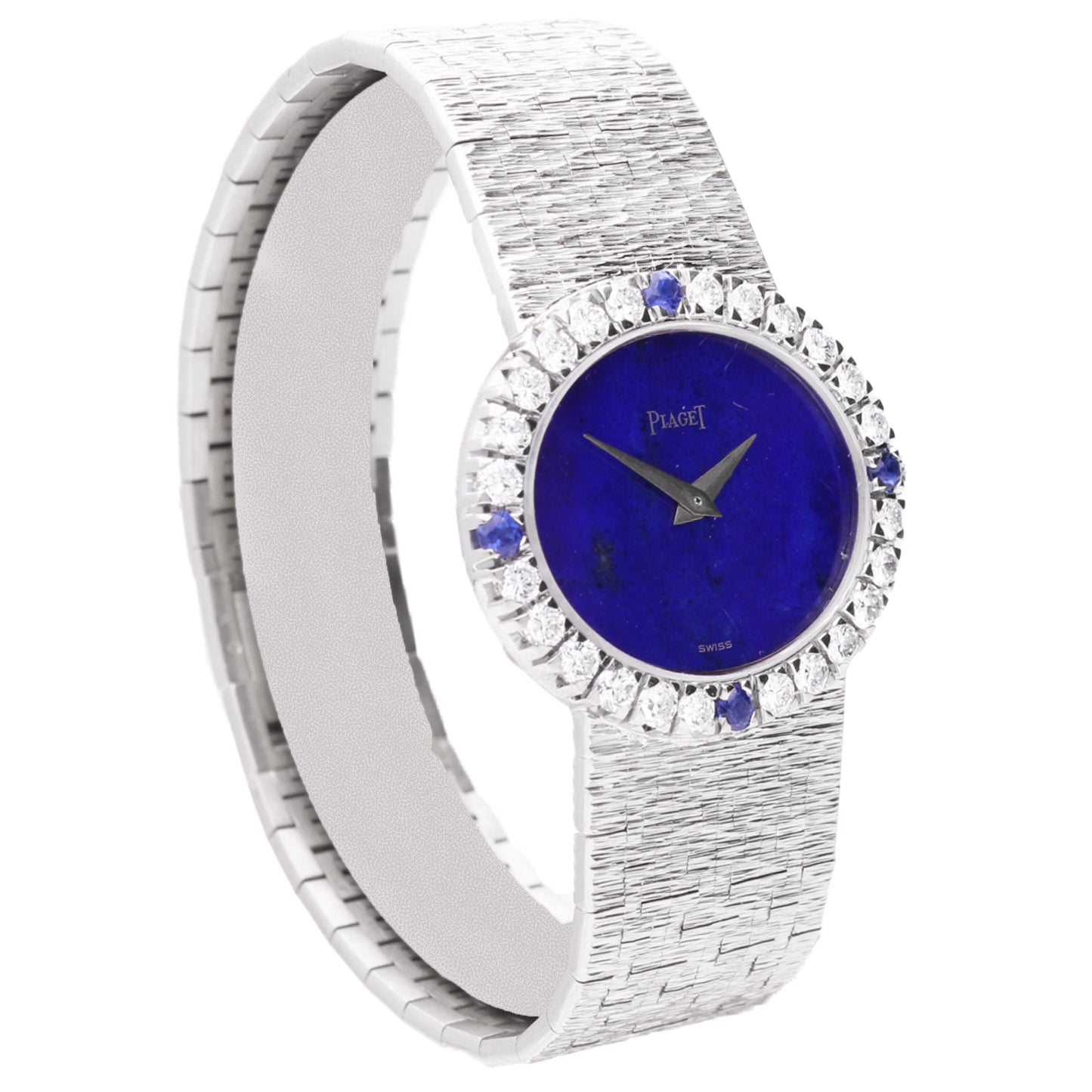 18ct white gold Piaget ref. 9804 bracelet watch with lapis lazuli dial and diamond set bezel with sapphire quarters. Made 1970