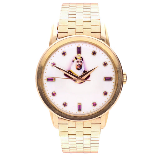 18ct rose gold Patek Philippe ref. 2481 Bracelet watch with enamel portrait of Abdulaziz “Ibn Saud” with ruby hour indices. Made 1955