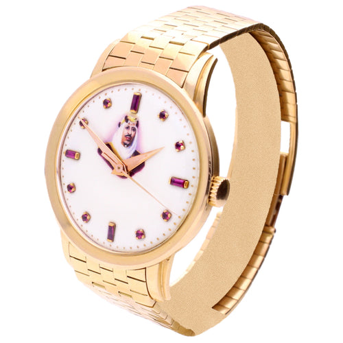 18ct rose gold Patek Philippe ref. 2481 Bracelet watch with enamel portrait of Abdulaziz “Ibn Saud” with ruby hour indices. Made 1955