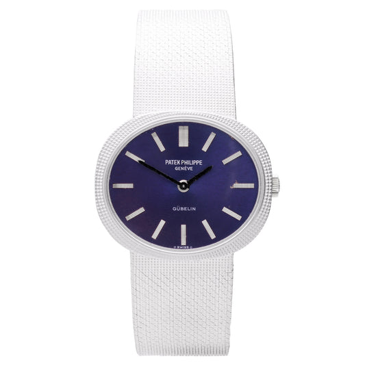 18ct white gold Patek Philippe ref. 3581/1 Ellipse bracelet watch with cobalt blue dial, retailed by Gübelin. Made 1972
