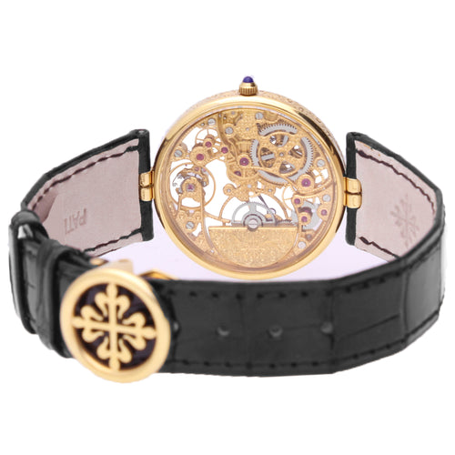 18ct yellow gold Patek Phillippe ref. 3878 Squellette automatic wristwatch. Made 1991