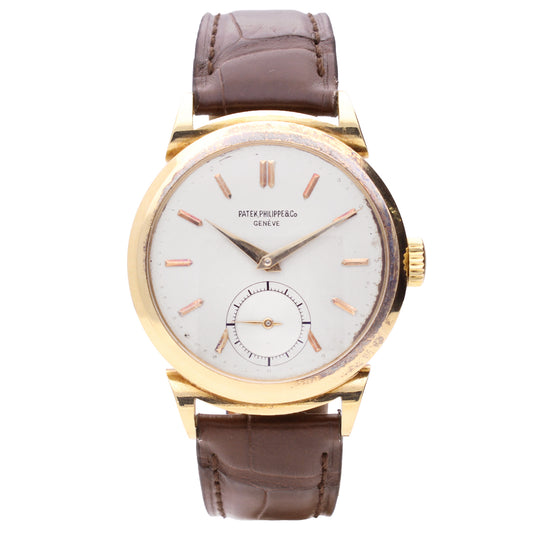 18ct yellow gold Patek Philippe ref. 1491 Calatrava wristwatch with scroll lugs. Made 1948