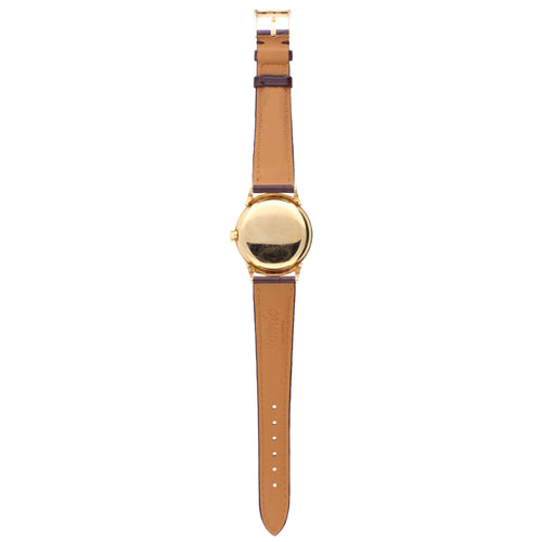 18ct yellow gold Patek Philippe ref. 1491 Calatrava wristwatch with scroll lugs. Made 1948