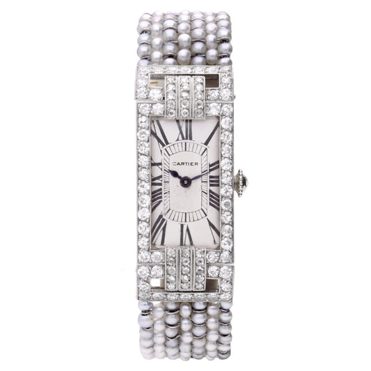 Platinum & 18ct white gold Cartier pearl set bracelet watch. Made 1920
