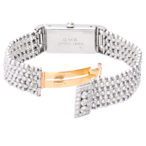 Platinum & 18ct white gold Cartier pearl set bracelet watch. Made 1920