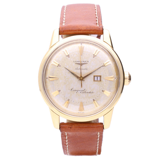 18ct yellow gold Longines Conquest calendar wristwatch. Made 1956