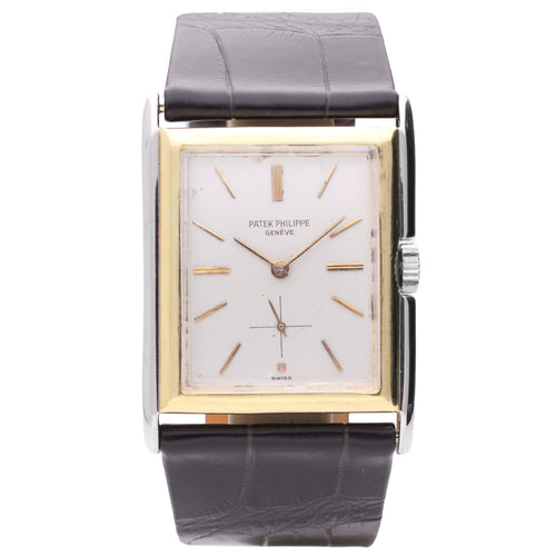 18ct white & yellow gold Patek Philippe rectangular wristwatch with stepped bezel.