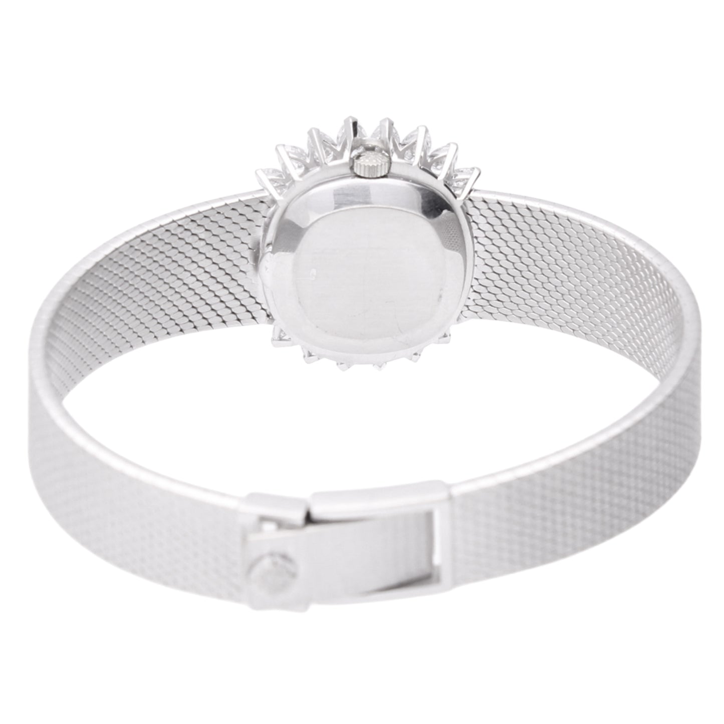 18ct white gold Patek Philippe bracelet watch with 'tapestry' dial and diamond set bezel. Made 1968