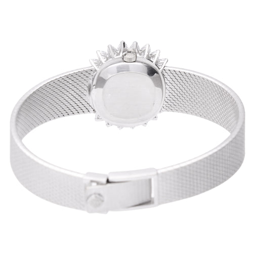 18ct white gold Patek Philippe bracelet watch with 'tapestry' dial and diamond set bezel. Made 1968