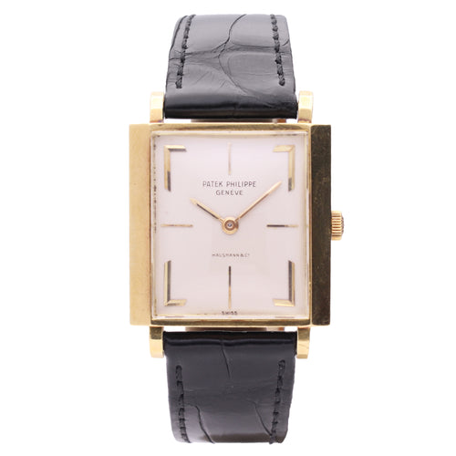 18ct yellow gold Patek Philippe square cased wristwatch, retailed by HAUSMANN & CO. Made 1964