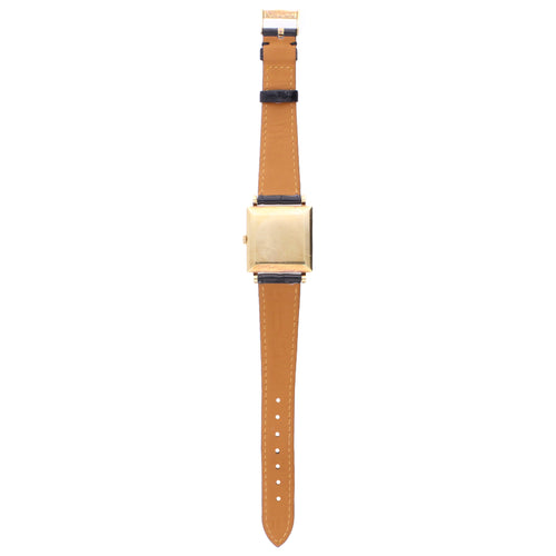 18ct yellow gold Patek Philippe square cased wristwatch, retailed by HAUSMANN & CO. Made 1964