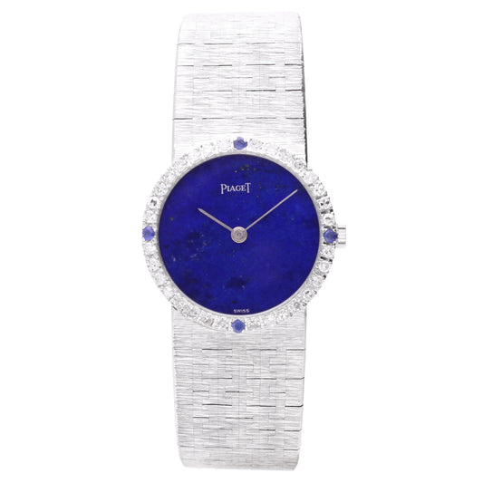 18ct white gold Piaget Bracelet watch with lapis lazuli dial and diamond set bezel with sapphire quarters. Made 1970