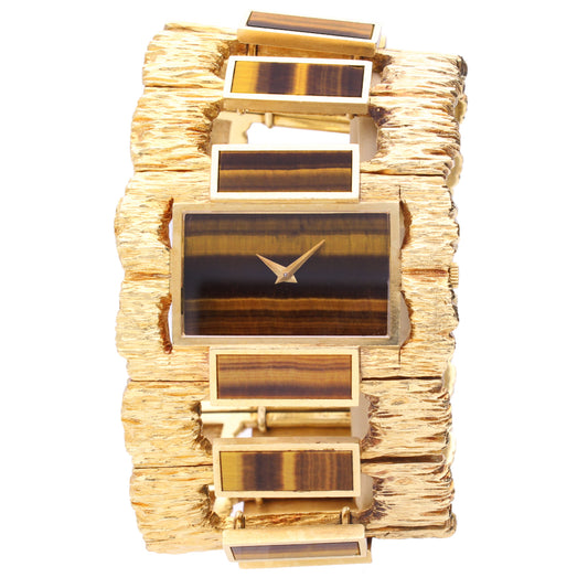 18ct yellow gold Piaget Tigers eye set cuff watch. Made 1970