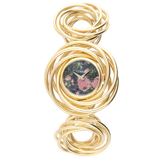 18ct yellow gold Corum "Spirales" bracelet watch with Chalcedony dial. Made 1970