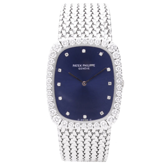 18ct white gold Patek Philippe Ellipse bracelet watch with cobalt blue dial and brilliant cut diamond set bezel. Made 1972