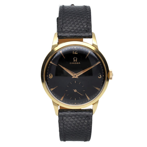 18ct yellow gold OMEGA black dial dress wristwatch. Made 1955